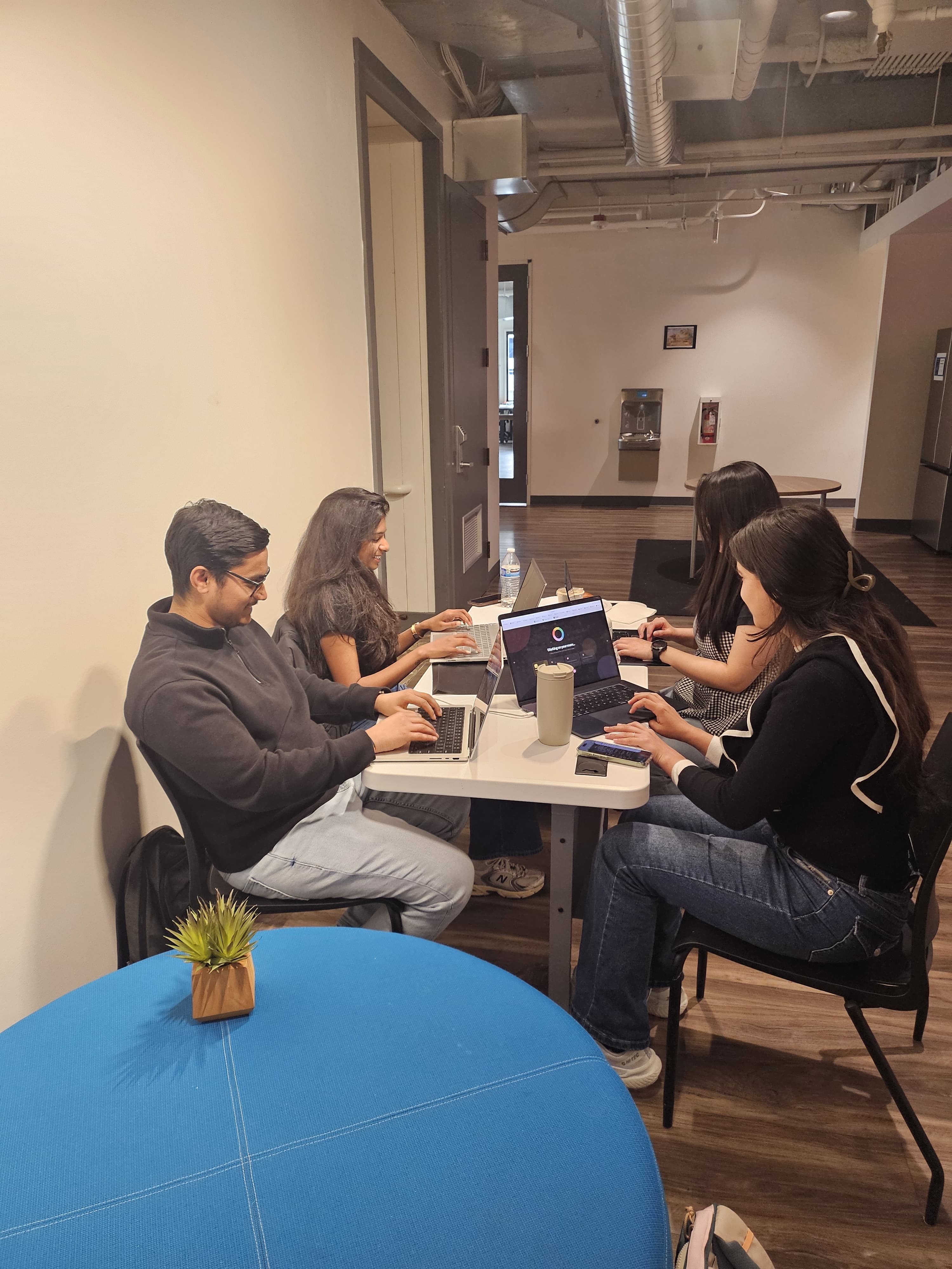 The team building the core flow on laptops